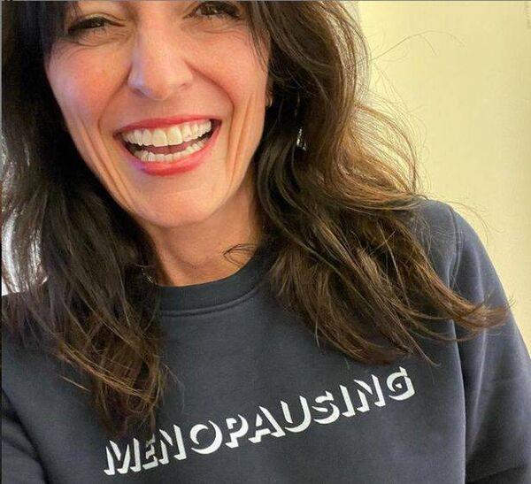 Davina McCall wears a 'menopausing' slogan sweater