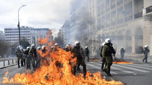 Clashes hit Athens as general strike staged in protest over rail disaster