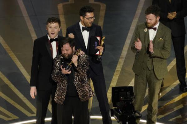 Ross White, from left, James Martin, Tom Berkeley and Seamus O'Hara accept the award for best live action short film for 