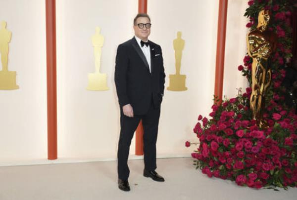 Brendan Fraser arrives at the Oscars on Sunday, March 12, 2023, at the Dolby Theatre in Los Angeles. (Photo by Jordan Strauss/Invision/AP)