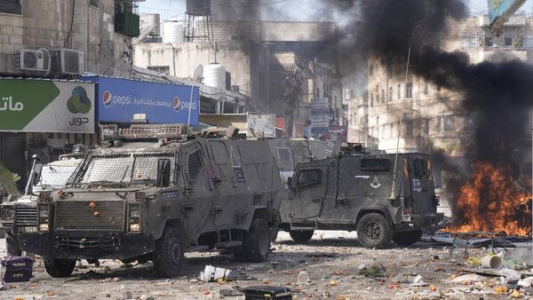 Two hurt in shooting as Egypt attempts to lower tensions in West Bank