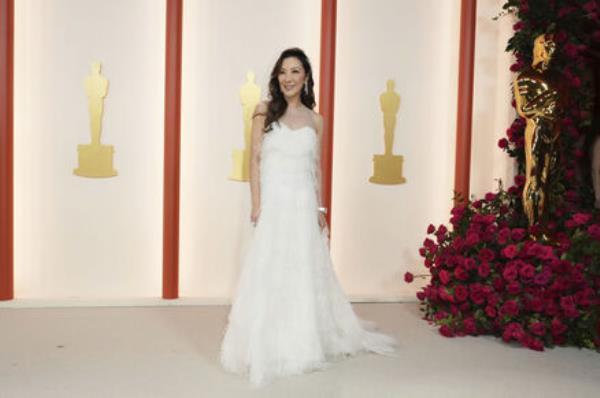 Michelle Yeoh arrives at the Oscars on Sunday, March 12, 2023, at the Dolby Theatre in Los Angeles. (Photo by Jordan Strauss/Invision/AP)