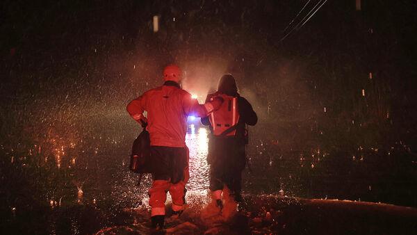 Hundreds evacuated as storm breaches California river’s levee